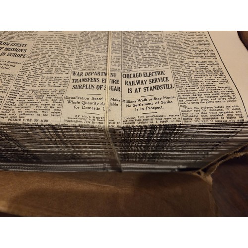 24 - Four boxes of Prop Newspapers.