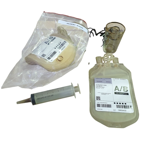 26 - A Quantity of Pottery Soup Bowls along with Blood Bags and syringes.