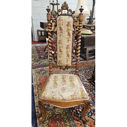 44 - A pair of 19th Century Rosewood Hall Chairs with highly pierced back. With different coloured uphols... 