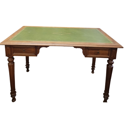 9 - A fantastic late 19th early 20th Century Walnut Writing Table with green tooled Leather top on turne... 