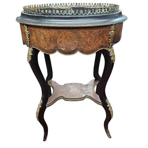 763 - A 19th Century Rosewood and Amboyna Continental Planter with ormolu mounts and ebonised outline. 58 ... 