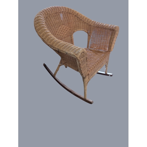 779 - A modern rectangular Coffee Table with canted corners along with a wicker rocking chair and another.