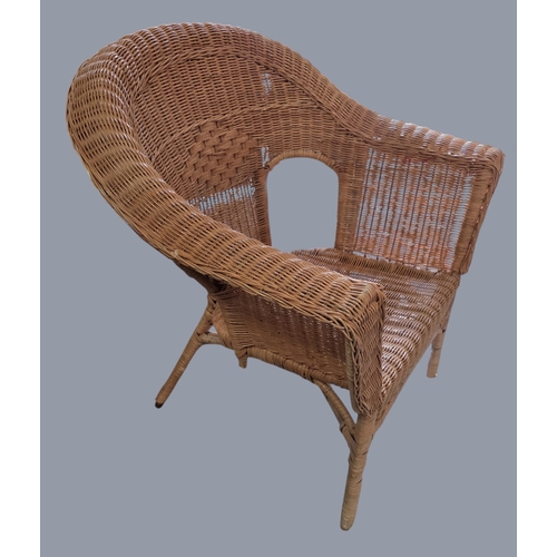 779 - A modern rectangular Coffee Table with canted corners along with a wicker rocking chair and another.