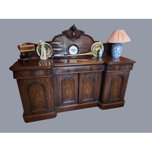 768 - A 19th Century Pedestal Sideboard with carved back. W 197 x D 60 x H 152 cm approx.