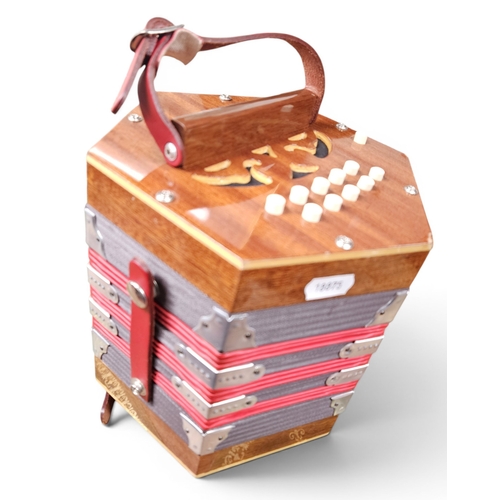 13 - A Gremlin squeeze box.