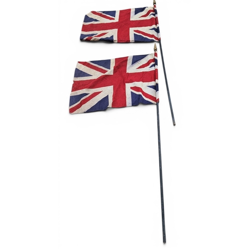 17 - Two late 19th early 20th Century British Flags on flag poles.