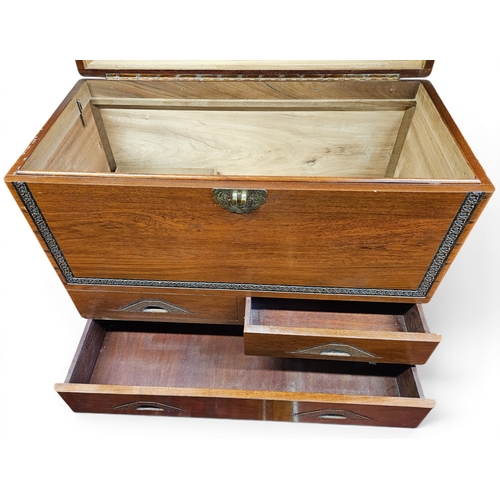 26 - A large Oriental Camphorwood Chest with lift up lid and frieze drawer base. 101x 51 x H 90 cm approx... 