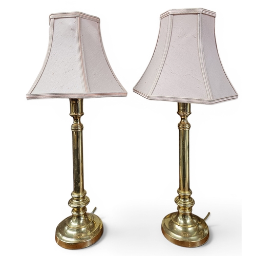 27 - A pair of 20th Century Brass Lamps. H 38 cm approx.