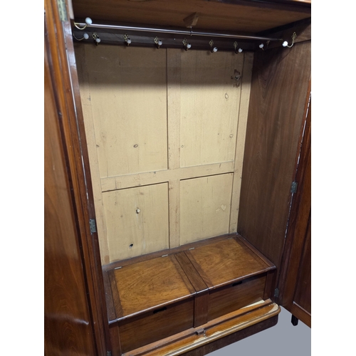 30 - A 19th Century Mahogany two door Wardrobe. W 114 x 54 x H 198 cm approx.
