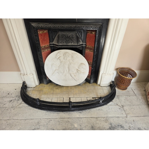 734 - A large 19th Century cast Iron demi lune fire Curb.