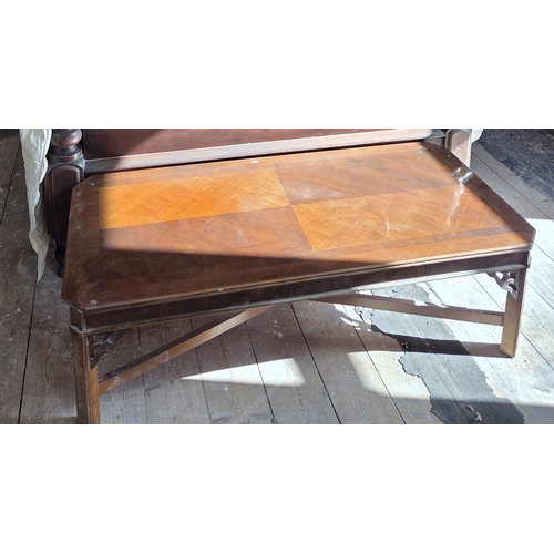 779 - A modern rectangular Coffee Table with canted corners along with a wicker rocking chair and another.