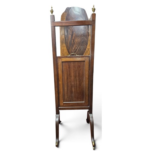 35 - A very unusual 19th Century Mahogany Cheval Mirror with a rise and fall centre on brass toe castors ... 
