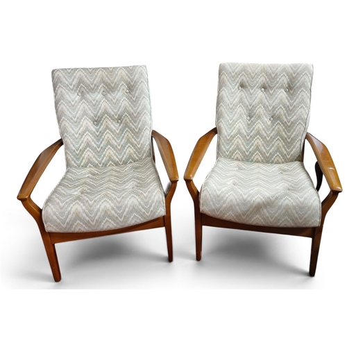 A pair of Mid Century easy Armchairs possibly Ercol. W 71 x SH 42 x BH 86 cm approx.