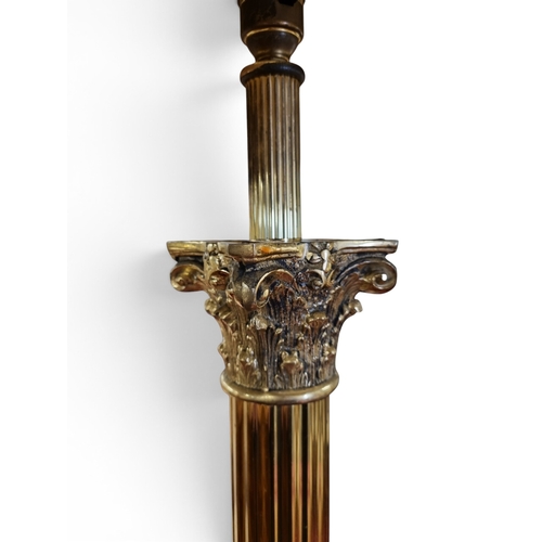 15 - A good heavy Brass Standard Lamp with columned support and platform base.
172 cm approx.
