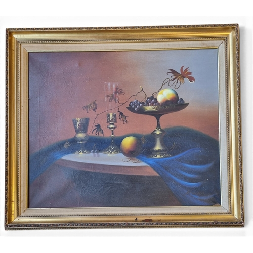 10 - A 20th Century Oil on Canvas Still Life of Fruit on a table setting. 60 x 50 cm approx.