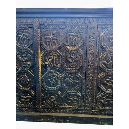 13 - A 19th Century raddled Continental low four door Cabinet with highly carved outline.
W 198 x D 47 x ... 
