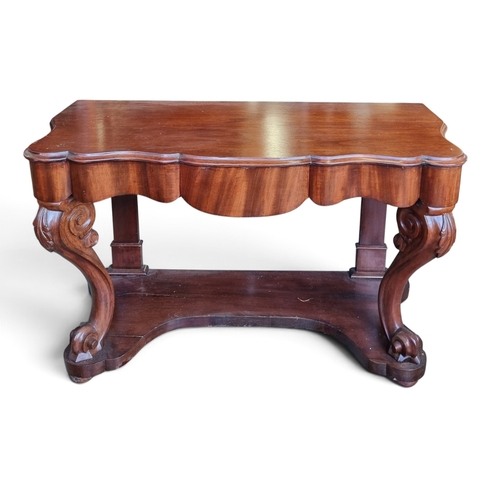 28 - A 19th Century Mahogany Hall Table with carved cabriole front supports and platform base.
W 121 x D ... 
