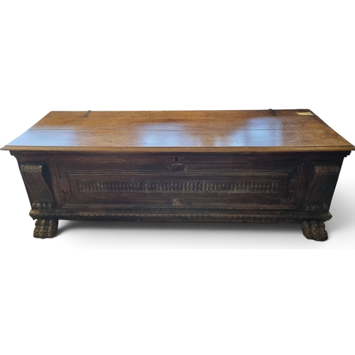 29 - A large 19th early 20th Century Oak hall Bin with highly carved front and hairy paw feet.
W 175 x D ... 