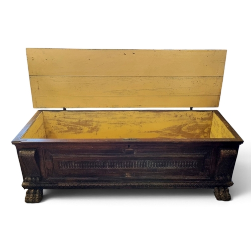 29 - A large 19th early 20th Century Oak hall Bin with highly carved front and hairy paw feet.
W 175 x D ... 