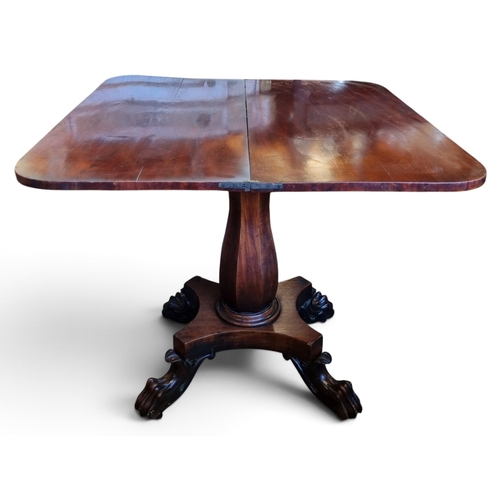 34 - A Regency Mahogany fold over Tea Table with hairy paw supports. W 91 x D 44 x H 76 cm approx.