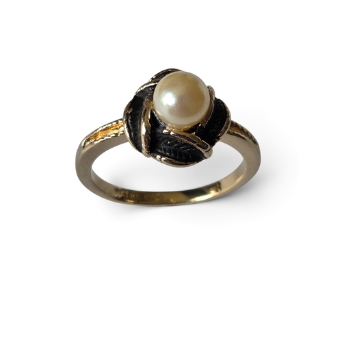 A 14ct Gold and Pearl ring, the pearl being set in a rose leaf decoration, size P with a gross weight of 3.59 grams approx.