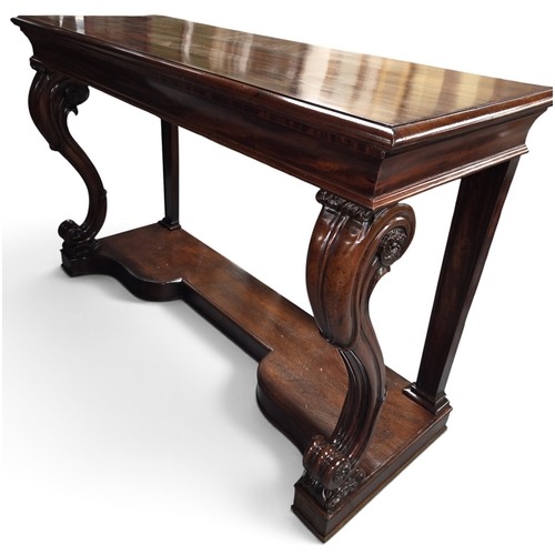 A superb William IV Mahogany Console Table with a highly carved front supports in a showroom finish, 159 x 58 x 100h cms approx.