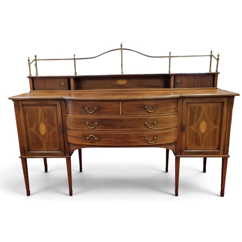 25 - A fantastic Edwardian Mahogany and Inlaid Sideboard with tambour door and brass gallery back consist... 