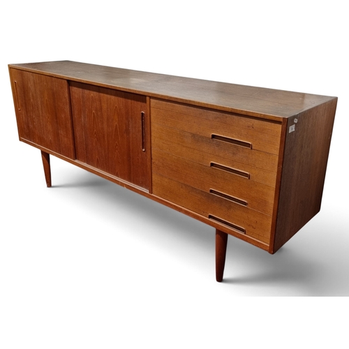 18 - A good mid Century Teak Sideboard possibly G Plan. 
W 190 x D 42.5 x H 79 cm approx.