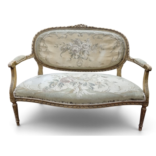 127 - A really good early 20th Century French two seater Couch with highly carved outline with turned reed... 