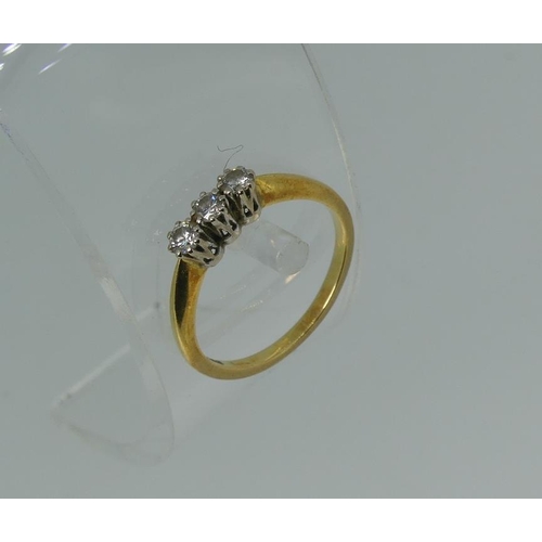 114 - A small three stone diamond Ring, mounted in 18ct yellow gold, Size K, together with a small diamond... 