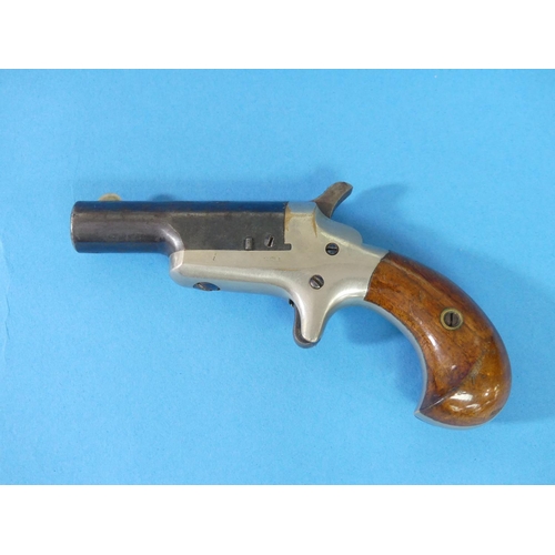 504 - A Colt .41 cal Derringer Pistol, the 2½in hinged barrel signed on the top 'COLT', with crescent fore... 