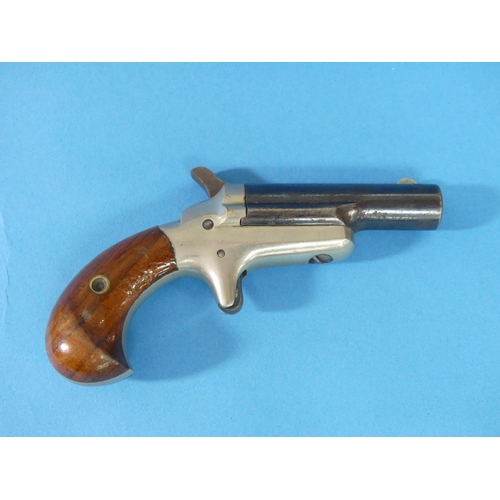 504 - A Colt .41 cal Derringer Pistol, the 2½in hinged barrel signed on the top 'COLT', with crescent fore... 