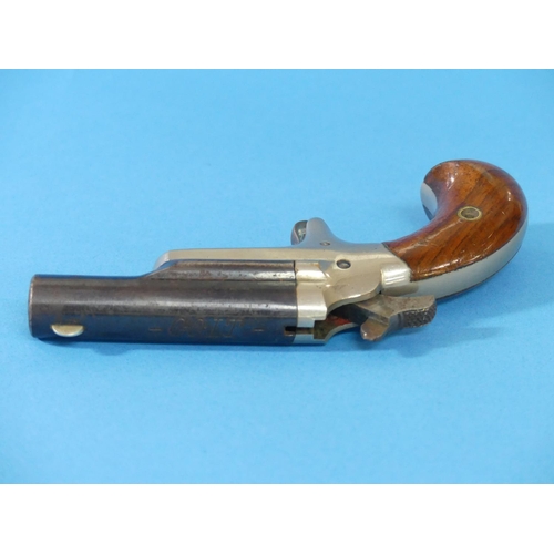 504 - A Colt .41 cal Derringer Pistol, the 2½in hinged barrel signed on the top 'COLT', with crescent fore... 