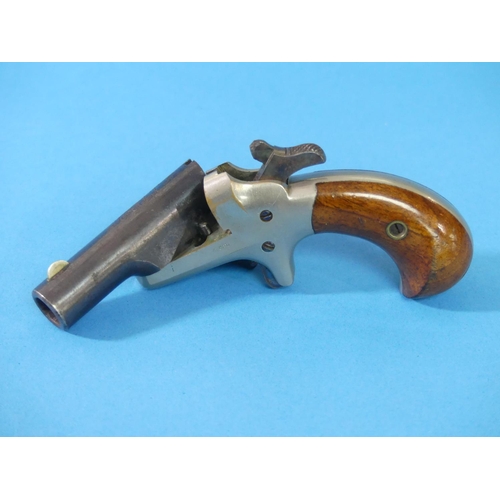 504 - A Colt .41 cal Derringer Pistol, the 2½in hinged barrel signed on the top 'COLT', with crescent fore... 