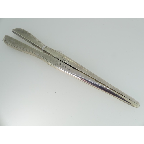 88 - A pair of George V silver Glove Stretchers, hallmarked Birmingham, 1913, of traditional form, the ha... 