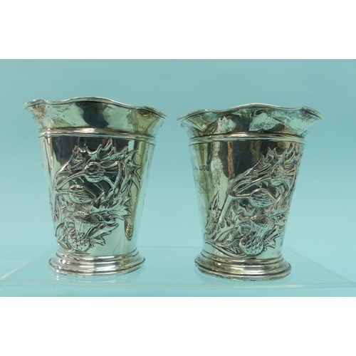 94 - A pair of Edwardian silver Vases, by Henry Matthews, hallmarked Chester, 1905, in the form of beaker... 