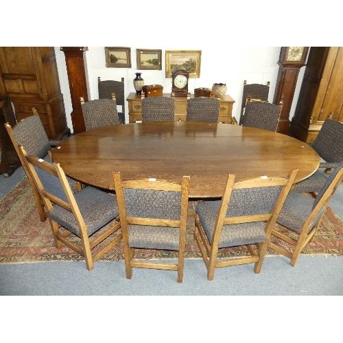 107 - An impressive 17thC style oak oval gate-leg Dining Table, by Bryn Hall Bespoke Furniture with shaped... 