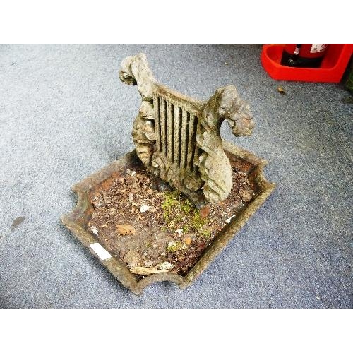 122A - A substantial Victorian cast iron Boot scraper, in the form of a lyre, 16in (41cm) wide x 12in (30.5... 