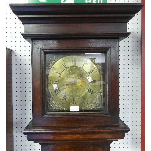 128A - A Georgian 30-hour longcase clock, the 10¼in (26cm) engraved brass dial with date aperture, signed '... 