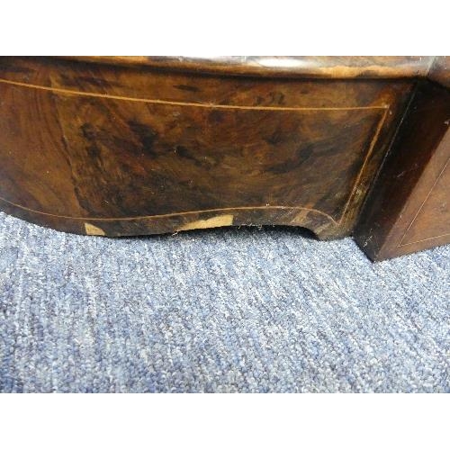 138 - A Victorian figured walnut and inlaid Credenza, with gilt metal mounts, the shaped top above central... 