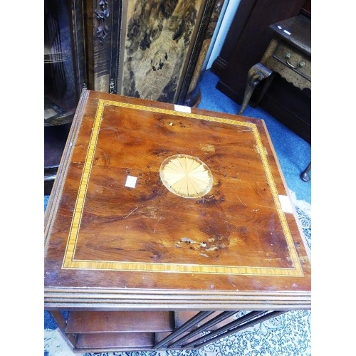 139 - An Edwardian style inlaid mahogany Revolving Bookcase, 18in (46cm) wide.