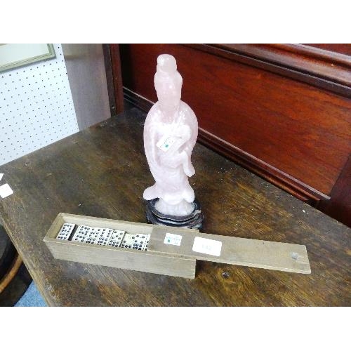 142 - A Chinese carved rose quartz figure of Guanyin, on wooden base, overall 11in (28cm) high, together w... 