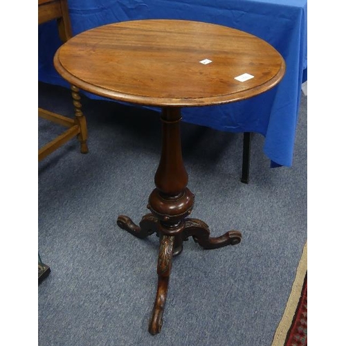 158 - A George III mahogany tripod Table, the circular top raised on leaf capped scrolling tripod base wit... 