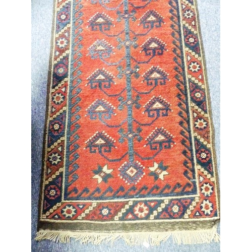 209 - Tribal Rugs;  a Turkish Dosemealti red ground runner, with blue tree-of-life design, set within a ge... 