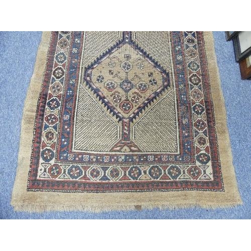 213 - Tribal Rugs; an antique Serab runner, the light beige ground woven with three conjoined diamond shap... 