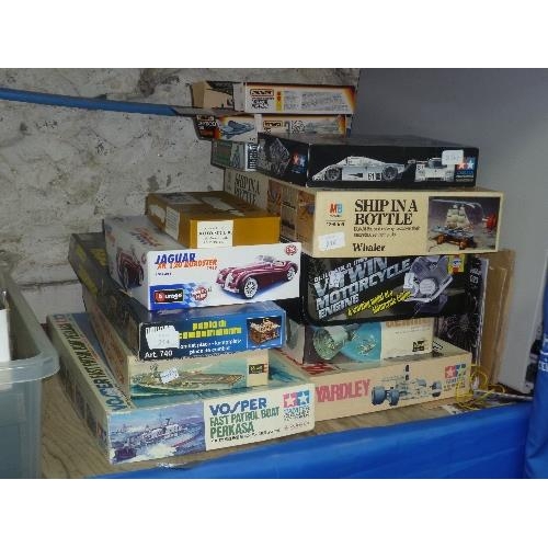 214 - A quantity of Scale-Model Kits, including Tamiya BS1217 Maclaren M23 1:12 Scale, Tamiya 1:72 Vosper ... 