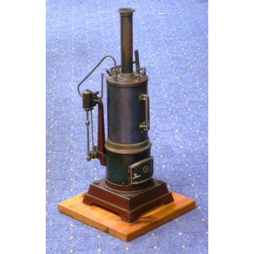 237 - A Carette model Steam Engine, circa 1912, with water-glass and steam whistle, 15½in (39.25cm) high, ... 