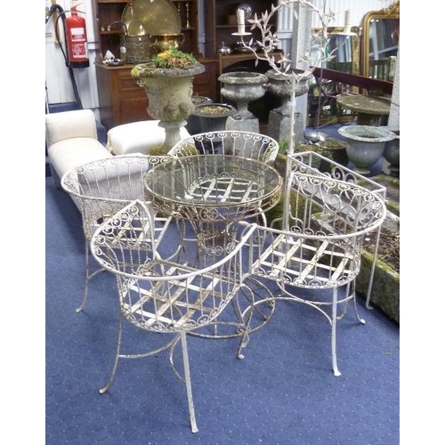 249 - A vintage white painted iron garden furniture set, comprising four chairs and circular table, chairs... 