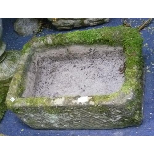 257 - Garden statuary:  two rectangular stone troughs, 31in x 15in (78.5cm x 38cm) and 23in x 16in (58.5cm... 