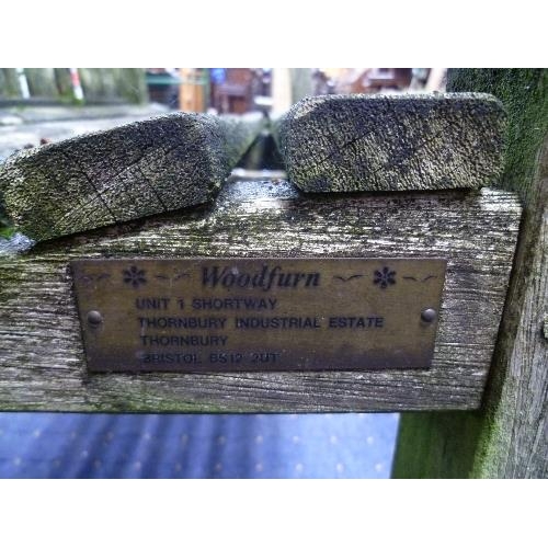 263 - A teak Garden Bench, labelled Woodfurn, Bristol, 49in (124.5cm) wide, together with another garden b... 